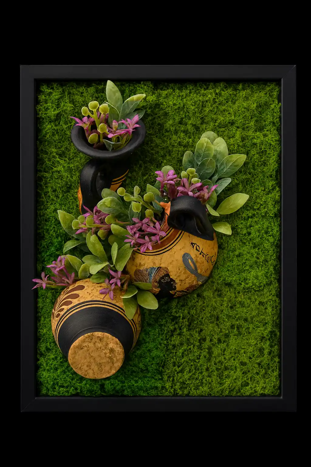 A botanical frame composition with moss, succulents, and small reclaimed pots